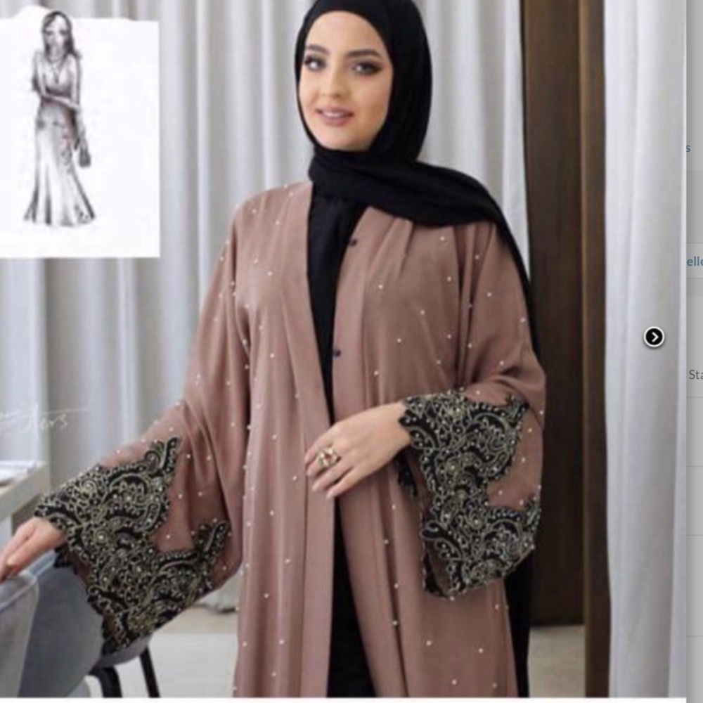 A beautiful luxury made in pearl Dubai Abaya.